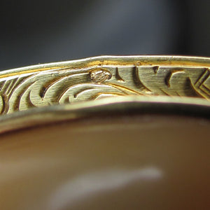French 18K gold eagle head hallmark close-up