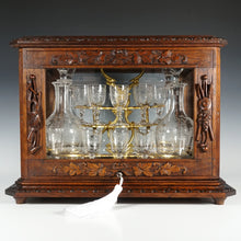 Load image into Gallery viewer, Antique Black Forest Liquor Tantalus Carved Wood Cabinet Box Caddy Victorian Engraved Crystal Decanters & Cordial Glasses