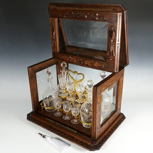 Load image into Gallery viewer, Antique Black Forest Liquor Tantalus Carved Wood Cabinet Box Caddy Victorian Engraved Crystal Decanters & Cordial Glasses