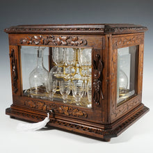Load image into Gallery viewer, Antique Black Forest Liquor Tantalus Carved Wood Cabinet Box Caddy Victorian Engraved Crystal Decanters &amp; Cordial Glasses
