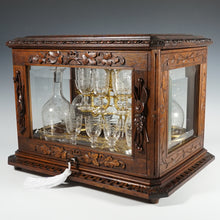 Load image into Gallery viewer, Antique Black Forest Liquor Tantalus Carved Wood Cabinet Box Caddy Victorian Engraved Crystal Decanters & Cordial Glasses
