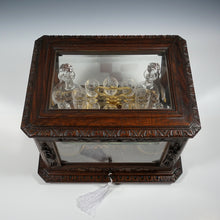 Load image into Gallery viewer, Antique Black Forest Liquor Tantalus Carved Wood Cabinet Box Caddy Victorian Engraved Crystal Decanters &amp; Cordial Glasses
