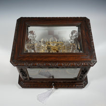 Load image into Gallery viewer, Antique Black Forest Liquor Tantalus Carved Wood Cabinet Box Caddy Victorian Engraved Crystal Decanters & Cordial Glasses