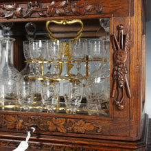 Load image into Gallery viewer, Antique Black Forest Liquor Tantalus Carved Wood Cabinet Box Caddy Victorian Engraved Crystal Decanters & Cordial Glasses