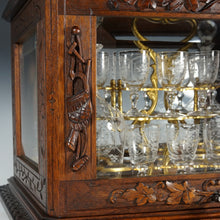 Load image into Gallery viewer, Antique Black Forest Liquor Tantalus Carved Wood Cabinet Box Caddy Victorian Engraved Crystal Decanters & Cordial Glasses