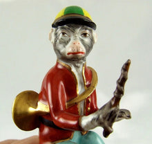 Load image into Gallery viewer, Rare French Porcelain Monkey Band Riding a Dog Figurine