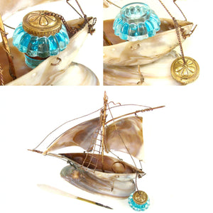 Antique French mother of pearl inkstand, electric blue glass inkwell, in the form of a sail boat