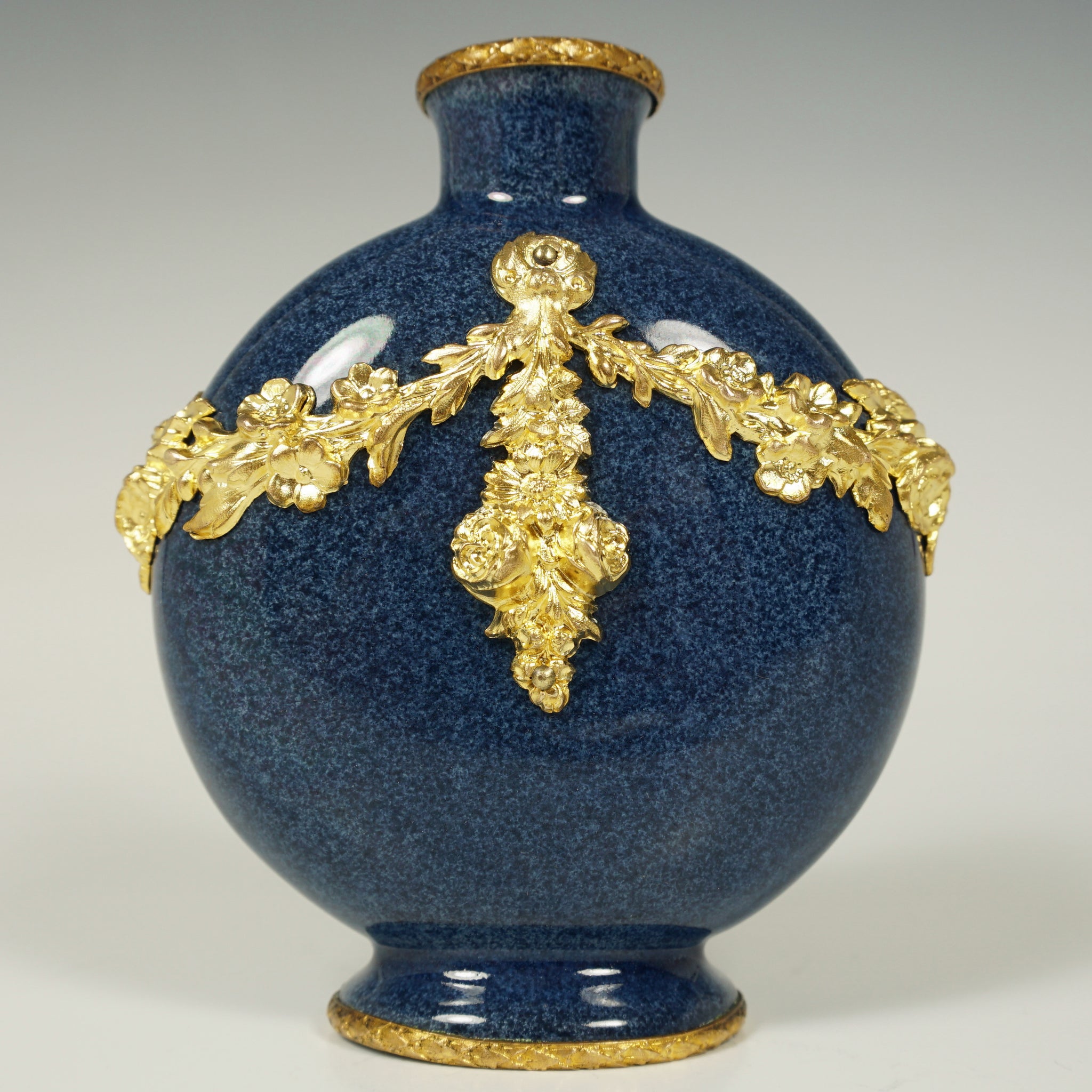 A Sèvres porcelain 'bleu profond semis de fleur de lys tea cup and saucer,  dated january 1816